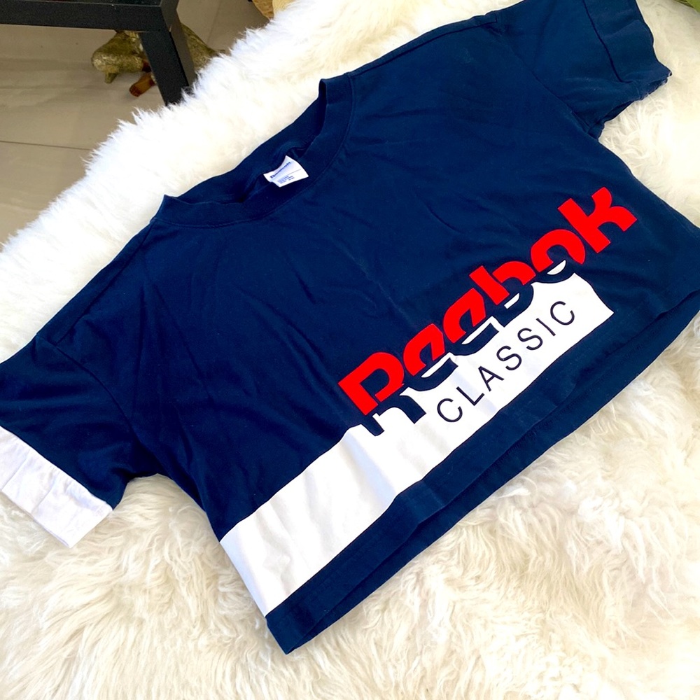 Cropped Reebok top.
